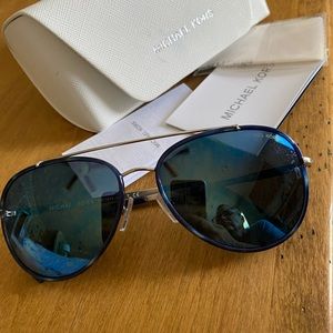 New Michael Kors Sunglasses. Only worn a couple of times.